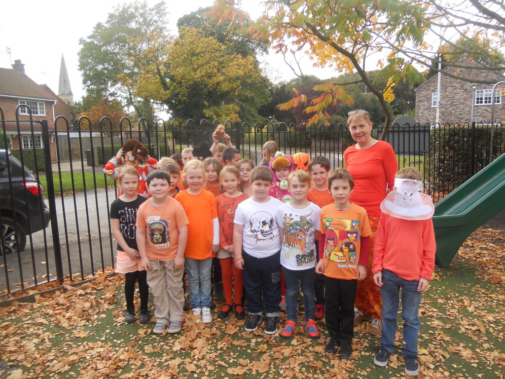 Here is Year 3 / 4 in their orange clothes, supporting orangutans. The school made over £70 to send to Chester Zoo, to help save their habitat.